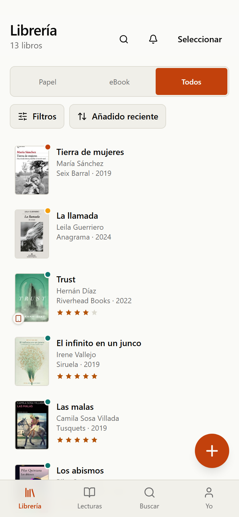 Librería de Lomos con varios libros, mezclando ejemplares físicos y ebooks con indicadores visuales de estado de lectura.